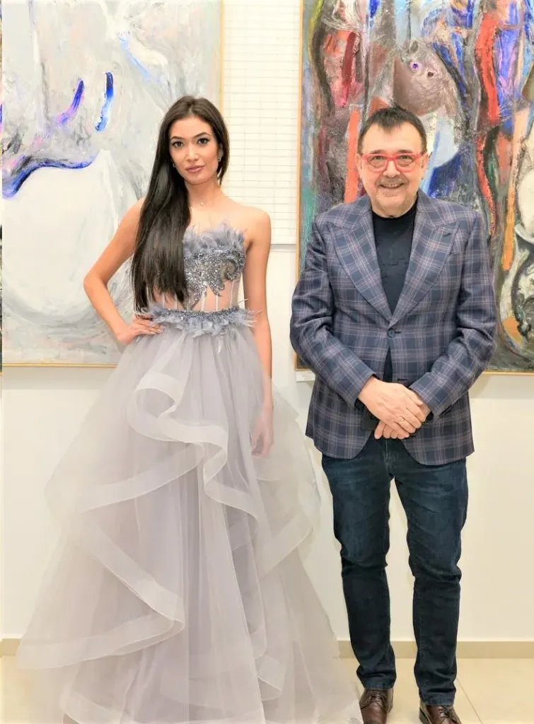 Проф. Любомир Стойков и Станимира Йоцова, облечена с рокля на модна къща Alegra.  Фото: © Академия за мода